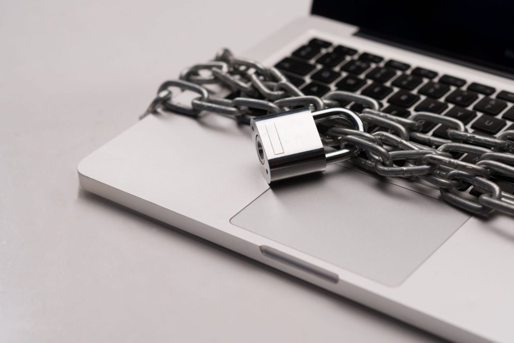 Endpoint Security (EDR) - Laptop protected by padlock and cyber security