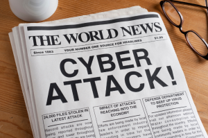 newspaper with cyber attack headline
